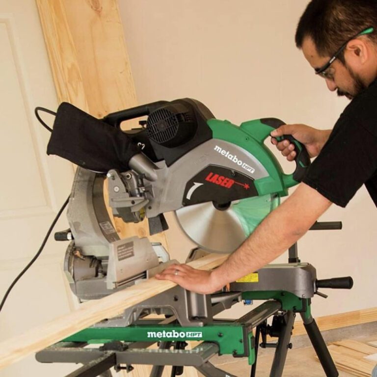 metabo miter saw cutting a board